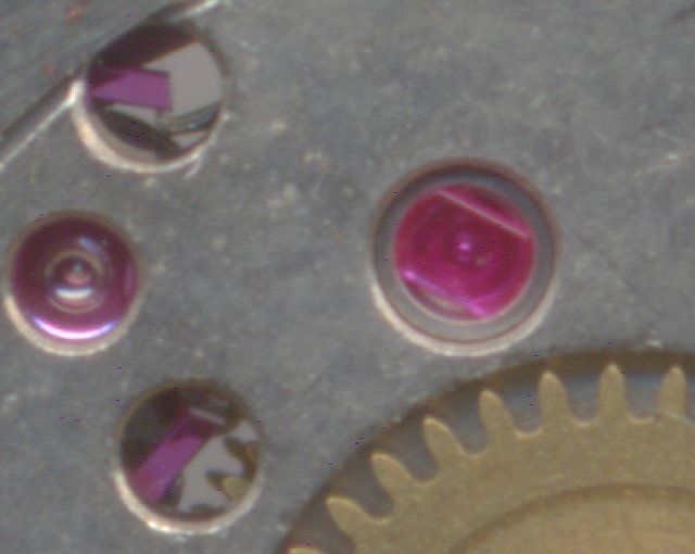 detail: cap jewel of the escapement wheel bearing PUW 1561: detail: cap jewel of the escapement wheel bearing